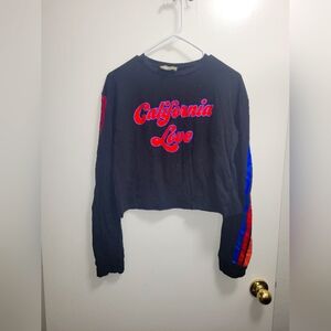 BLOCK PARTY WOMENS LONG SLEEVE CROP TOP IN SIZE SMALL. EXCELLENT CONDITION